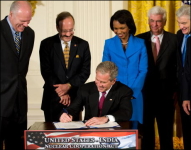 Bush signs deal